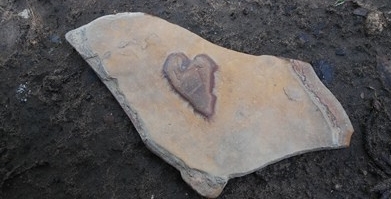 Rock with heart smaller